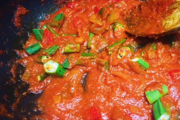 Okra and red pepper added to jollof rice sauce ghana nationaldish