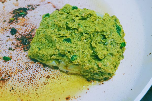 Smother cod in homemade pesto and place into a hot pan skin side down Italian national dish