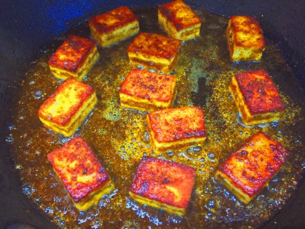 Gently fry the paneer on each side to get a golden colour Indian food from National Dish