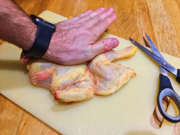 Press down firmly until you dislocate the legs to Spatchcock Poussin | National Dish