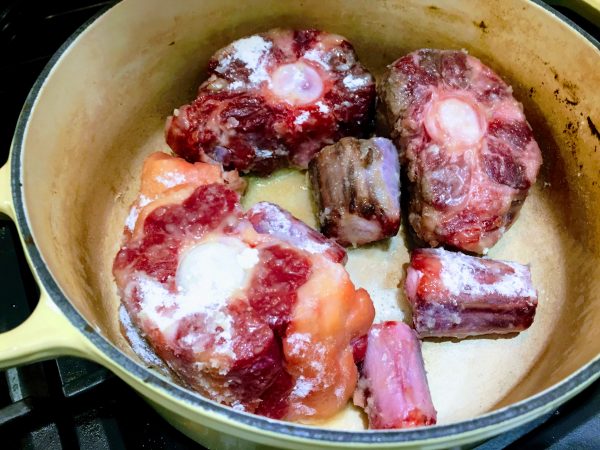 Seal your oxtail over a high heat and get some colour onto it.